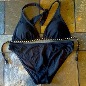 NWOT never work black suit with gold studs.